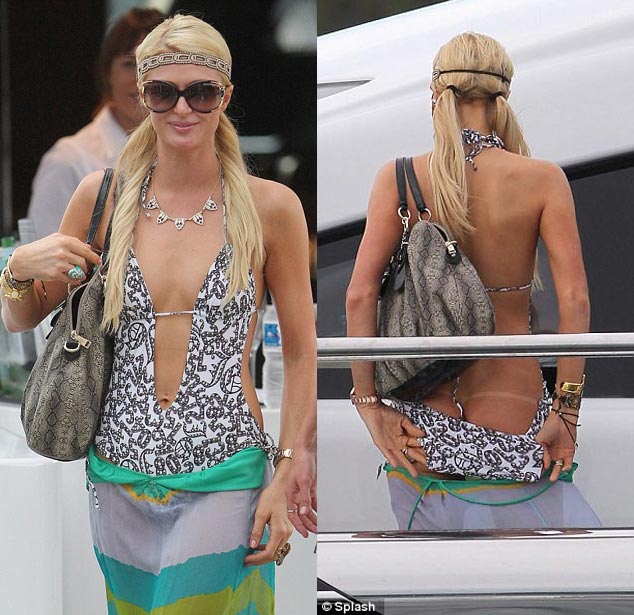 Paris Hilton Shows Off Tan Lines In Thong Bikini (PHOTOS