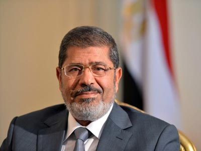 Egypt's President Mohamed Morsi makes bid to reinstate Islamist parliament