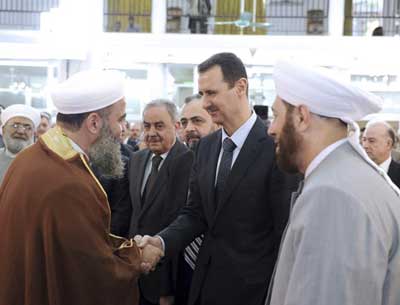 Bashar al-Assad makes rare public appearance in Damascus for Eid prayers