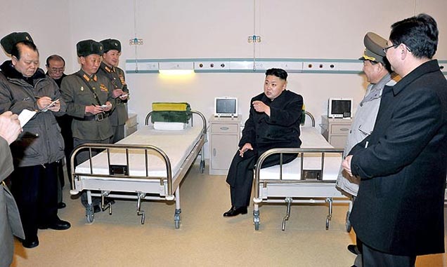 North Korea's leader Kim Jong-un smoking in hospital