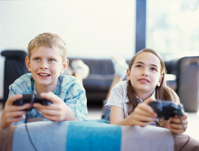 Children who play video games for less than an hour a day are 'better adjusted'